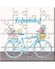 Puzzle bicicleta con la frase “Felicidades” en lata